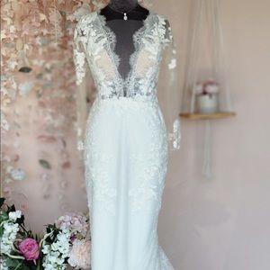 Fit and flare plunging neckline wedding dress